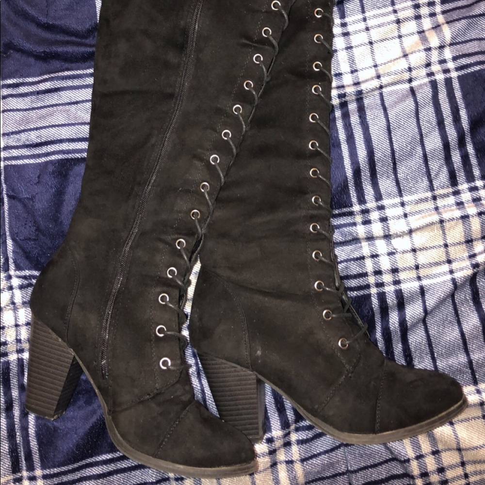 Thigh high black boots